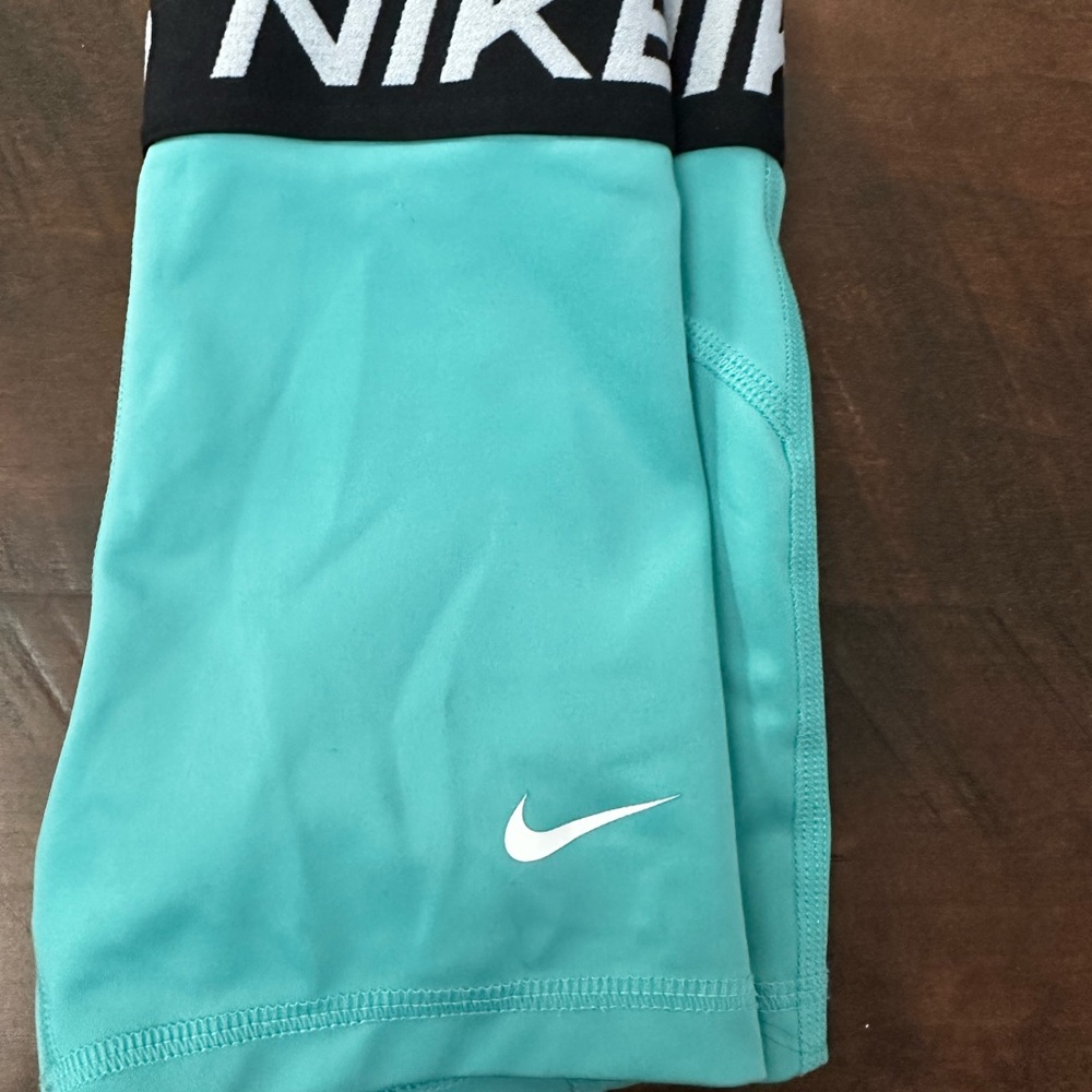 Nike Kids pro Aqua and Black Shorts
